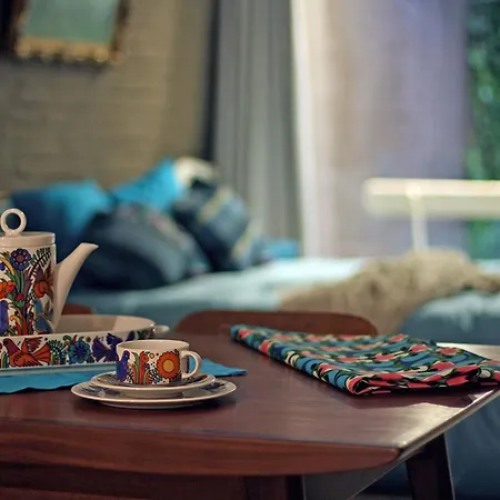 Lounge In The Intimate Urban Garden At A Retro Getaway