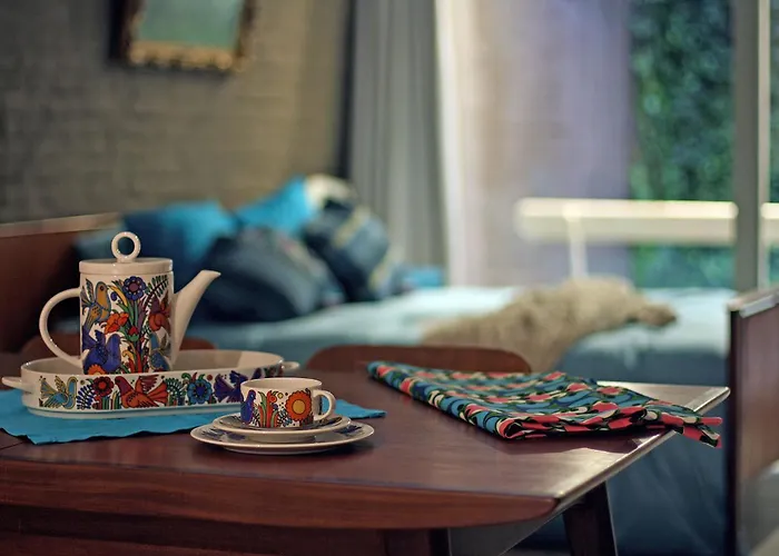 Lounge In The Intimate Urban Garden At A Retro Getaway